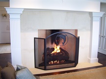 Living Room fireplace with custom screen and massive gas logs