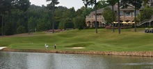 9th_green_and_Governors_Club_clubhouse.jpg